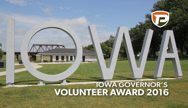 the large IOWA letters in front of the Kirchoff Shelter House in Manning, Iowa with the overlaid title Iowa Governor's Volunteer Award 2016