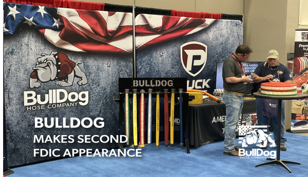 Eric talking to a customer in front of the BullDog booth at FDIC with the overlaid title BullDog Makes Second FDIC Appearance