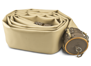 the WAT-Hog large-diameter hose rolled up and lying on its side