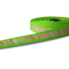 Hi vis Hi-Combat hose rolled in a donut on its side showing off etching