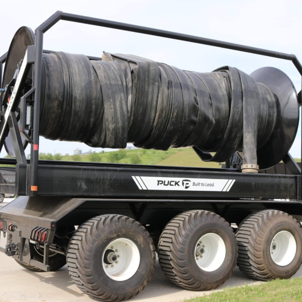 right side view of Puck TTR30 turn table hose reel with hose on reel outside