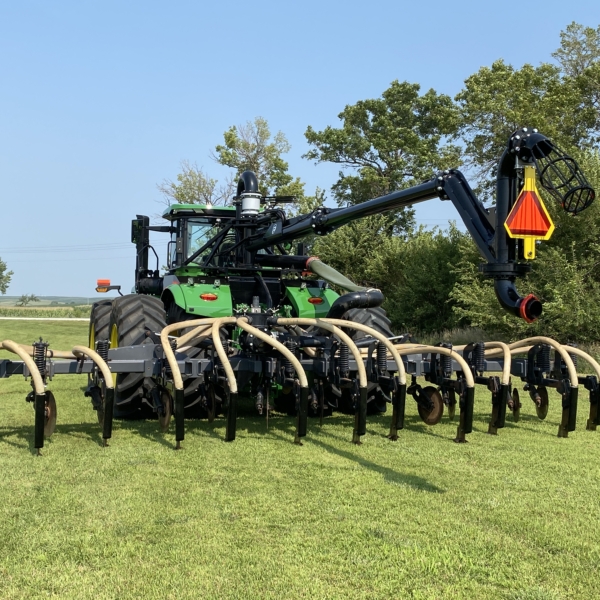 John Deere 9R with Puck 4WD Swingarm and toolbar