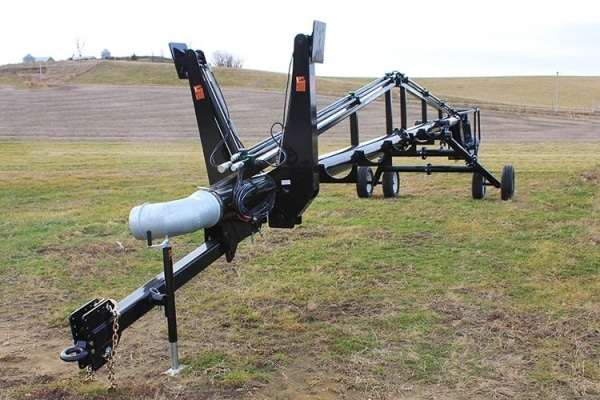front side of a lagoon feeder parked in a field
