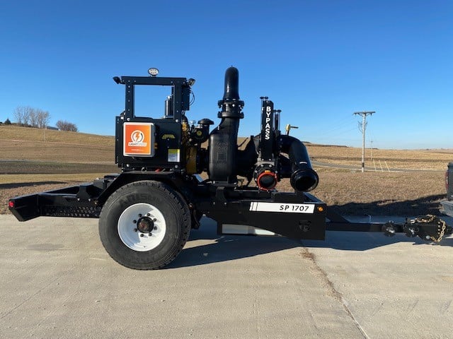 side view of the self prime trailer with LightSpeed technology attached to a truck hitch