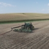 a 4WD toolbar mounted on a tractor with drag hose on the swingarm