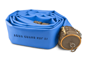 a tan aqua guard hose rolled up and lying on its side