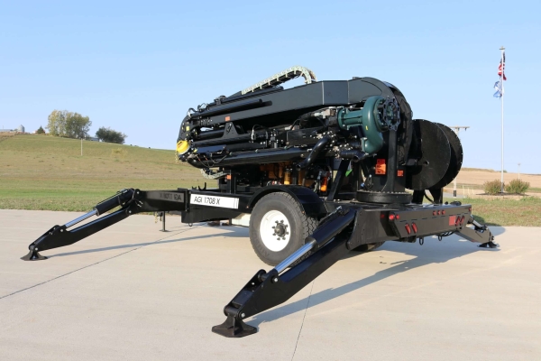 the long reach agitation trailer, AGI 1708X, folded up for easy storage and set on levelers