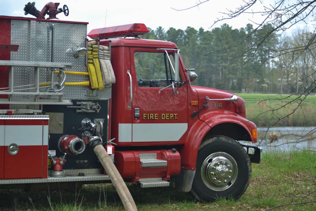 a firetruck with a hose connected
