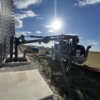 Puck AGI Doda 420 with boom extended into barn pit