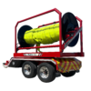 rear driver side view of Puck Fire TTR15P in transport mode with hi-vis TPU supply hose Hi-Vol TPU on the reel