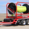 front drivers side angle of Puck Fire TTR15P in transport mode with hi-vis TPU supply hose Hi-Vol TPU on the reel
