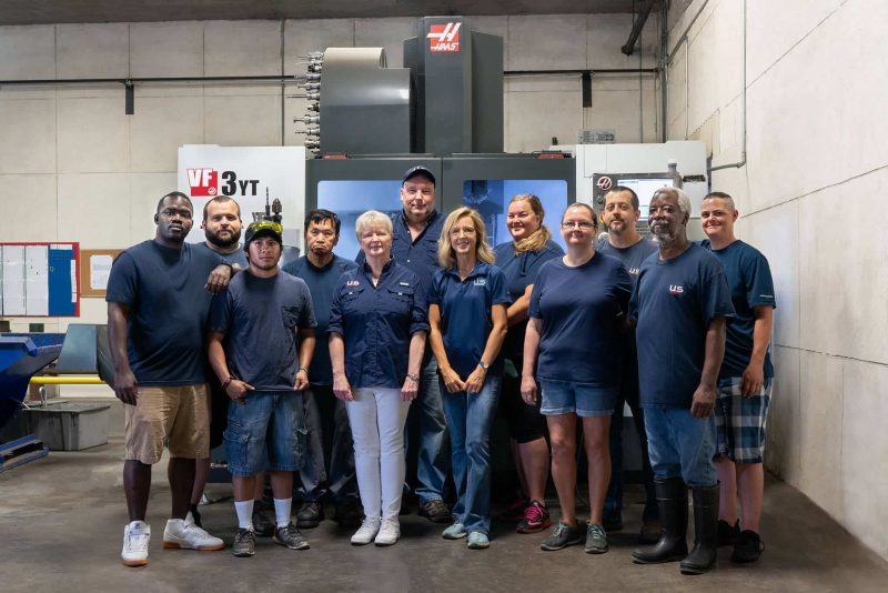 U.S. Coupling team of employees posing together