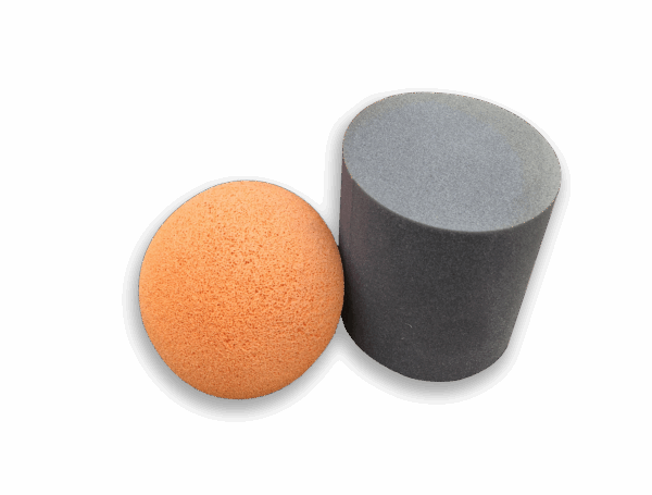orange foam pigging ball and gray bullet