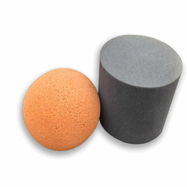 orange foam pigging ball and gray bullet
