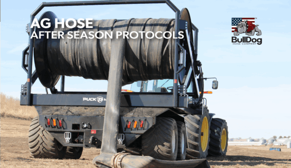 an image of a Puck turn table reel behind a tractor laying black, large diameter hose with the overlaid title Ag Hose After Season Protocols