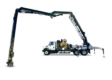 a fully extended boom truck manure pump unit on display
