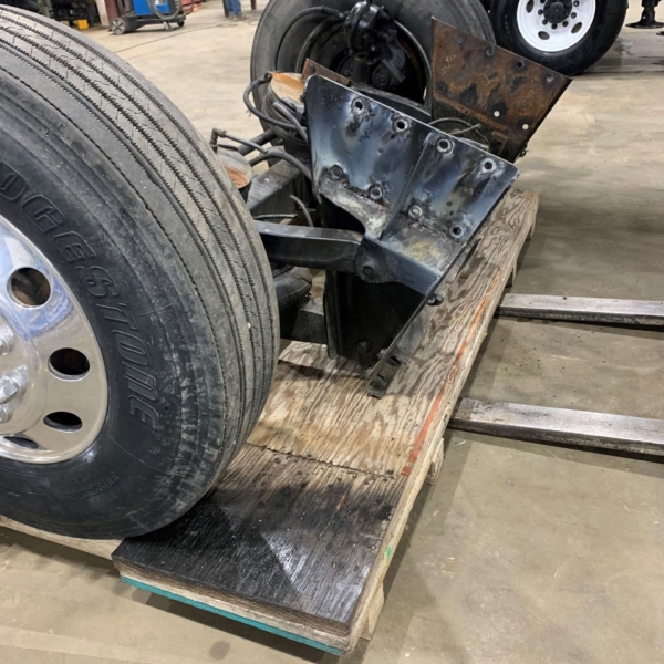 Steer drop axle with tires and rims