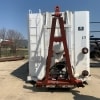 the front of a white Larsen Water Containment Tank
