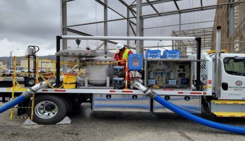 Aqua Guard hoses connected to a municipal truck