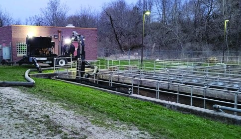 pump and hoses hooked up to a city municipal water site