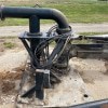 a close view of a used swinger sitting outside