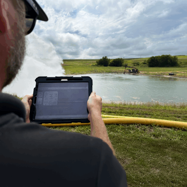 looking at LightSpeed on a tablet while watching water sprayed