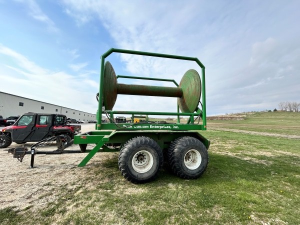 side view a used green PCE turn table reel