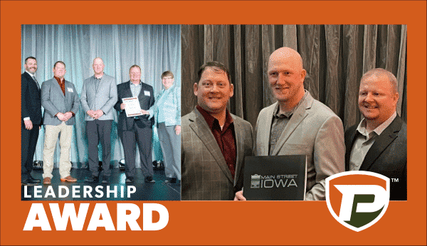 Leadership Award; Jeff Blum, Jake Doyel, and Chris Reis accepting the Leadership Award on behalf of Puck at the Main Street Iowa conference