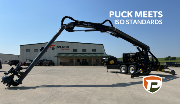 a FF 3009 T with extended boom sits in front of the Puck Manning offices
