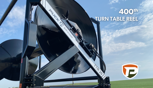 an image from the POV looking up at the domed rel ends of a TTR 20 with teh overlaid title words 400th Turn Table Reel in the top right corner and the Puck shield logo in the bottom right corner