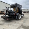 the back drivers side angle of a Puck PT 5770 liquid manure booster pump trailer