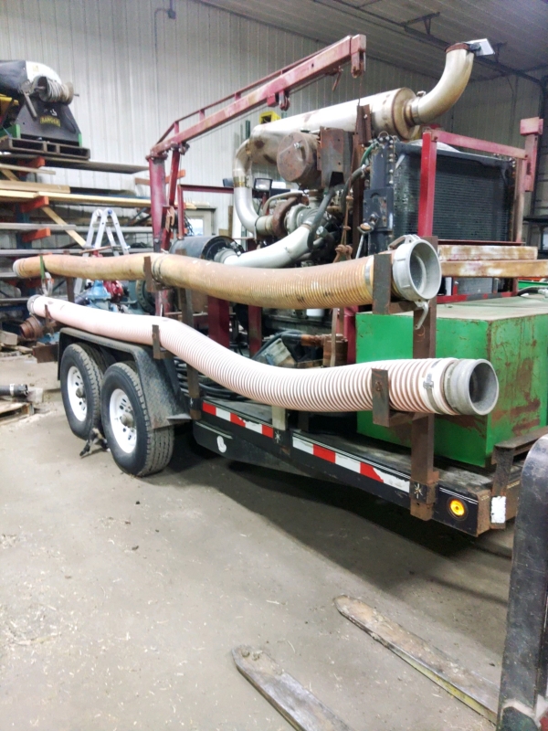 the front drivers side of a 355 Cummins manure pump trailer for sale