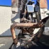 the front of a used agitation boat on a boat trailer