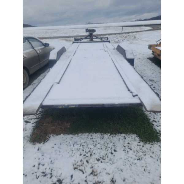 Puck 2013 2067C agitation boat trailer covered in snow