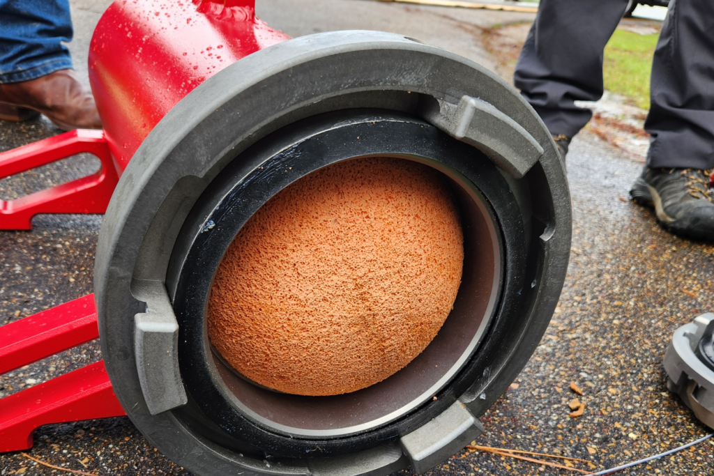 a foam pigging kickball inside a US Coupling manifold pig shooter