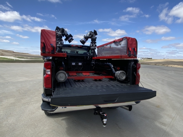 back side of a Puck Quick Attack with the truck bed open to display the dual inlet piping