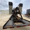 the back of a Puck Used Equipment - B221-Agitation Boat with trailer