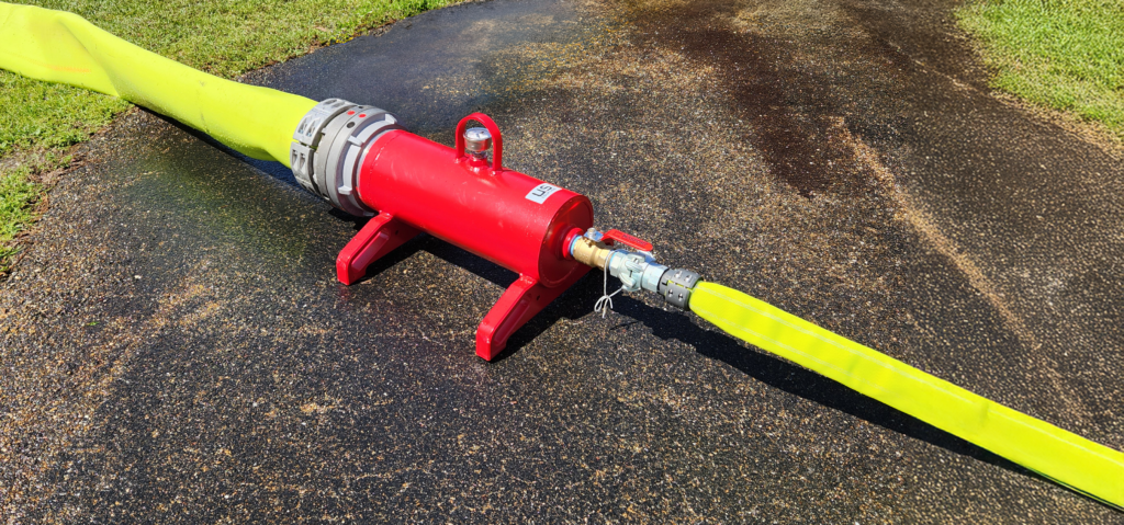 Air Raid hose connected to a Pig Launcher on one end and Hi-Vol TPU XLDH hose connected to the other
