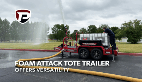 a man on the back of a Puck Fire Foam Attack Tote Trailer spraying water into a field via the riser pipe with the overlaid title reading Foam Attack Tote Trailer Offers Versatility