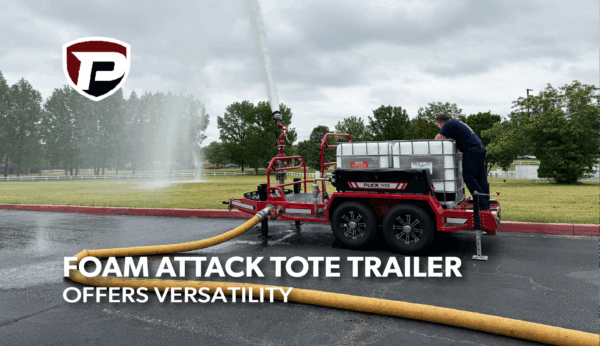 a man on the back of a Puck Fire Foam Attack Tote Trailer spraying water into a field via the riser pipe with the overlaid title reading Foam Attack Tote Trailer Offers Versatility